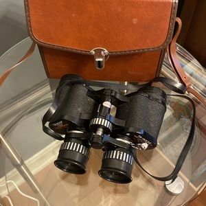 Vintage Tasso binoculars with leather case.